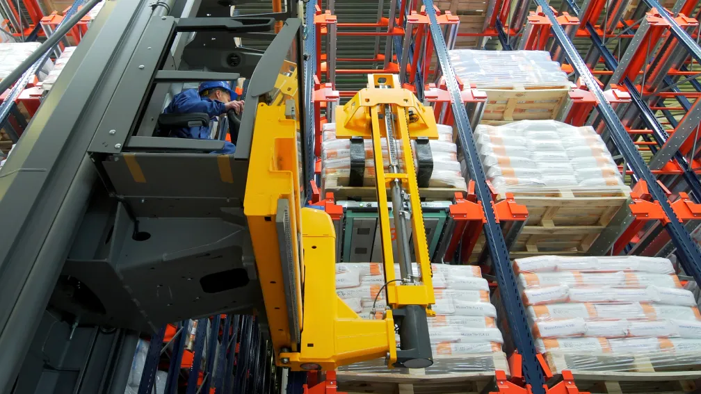 High-Density Pallet Storage: Unit-Load AS/RS Cranes vs. Deep-Lane Shuttles